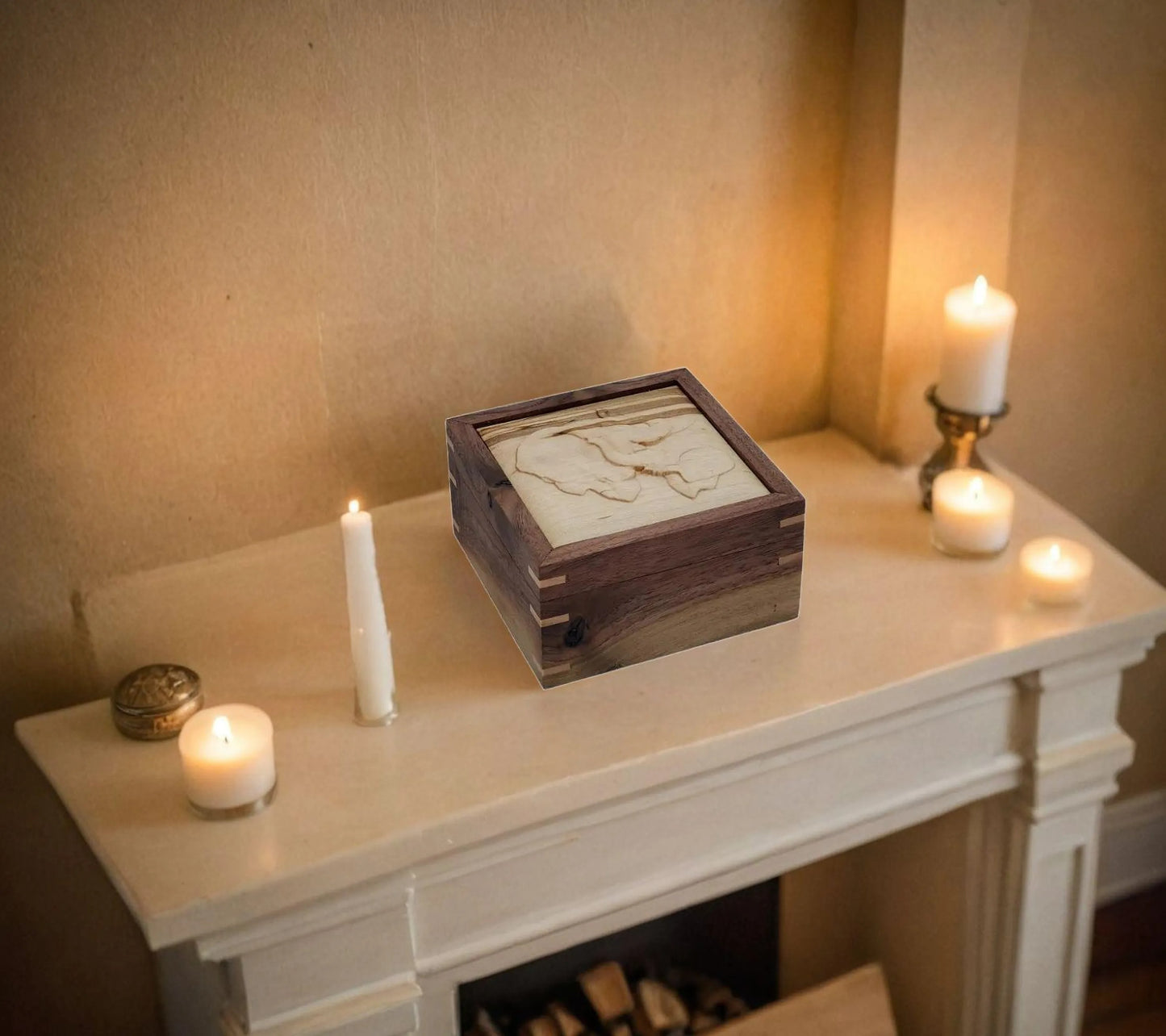 Walnut keepsake box or pet urn with a carved Elephant top cover