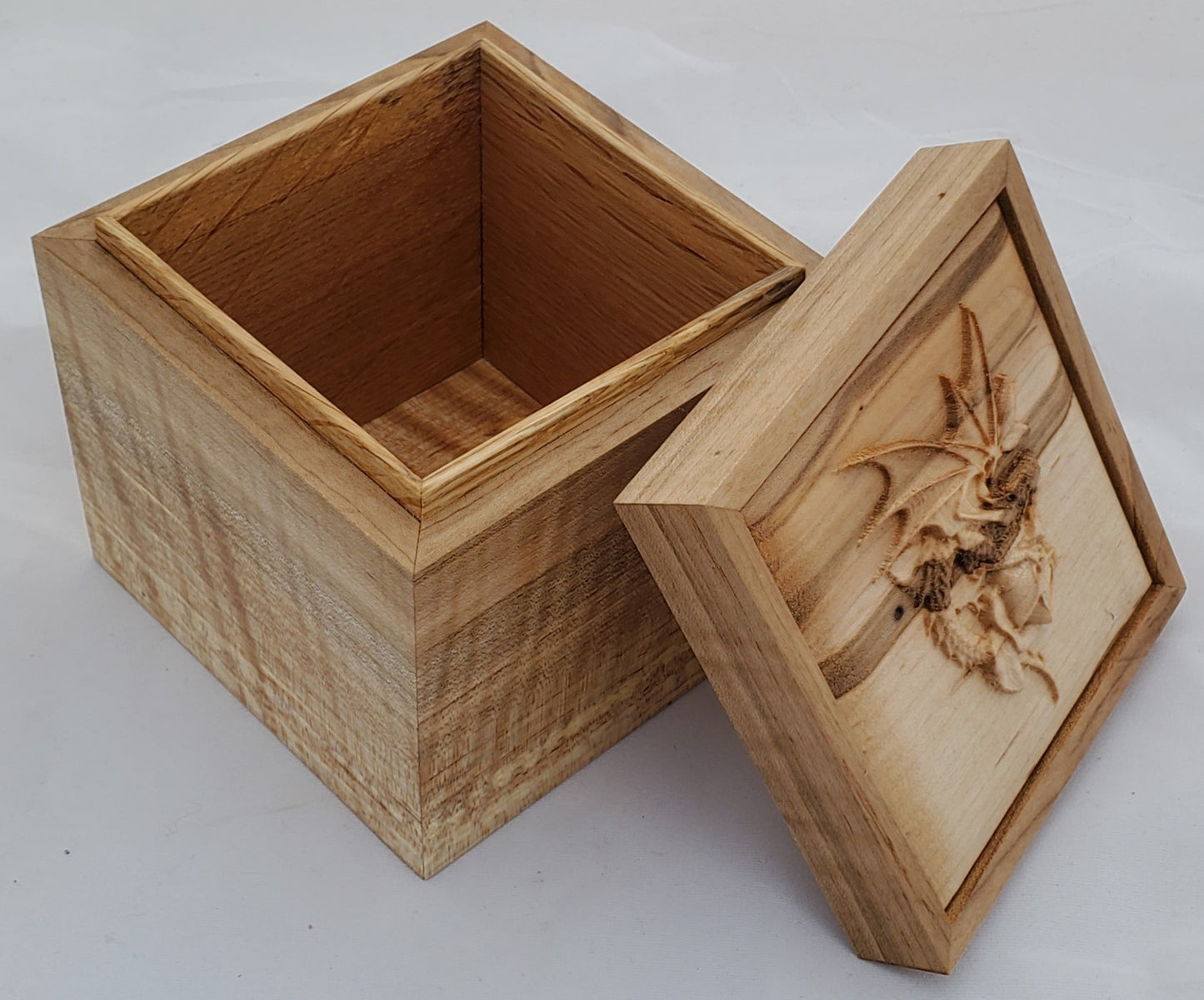 Maple keepsake box or pet urn with a carved Dragon and Rose on top cover