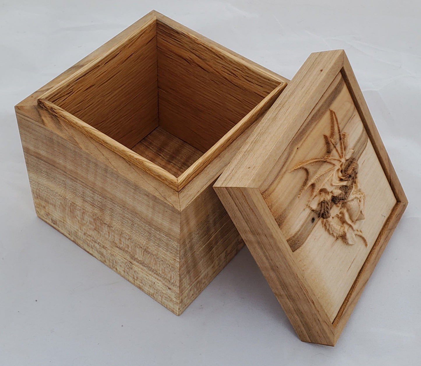 Maple keepsake box or pet urn with a carved Dragon and Rose on top cover