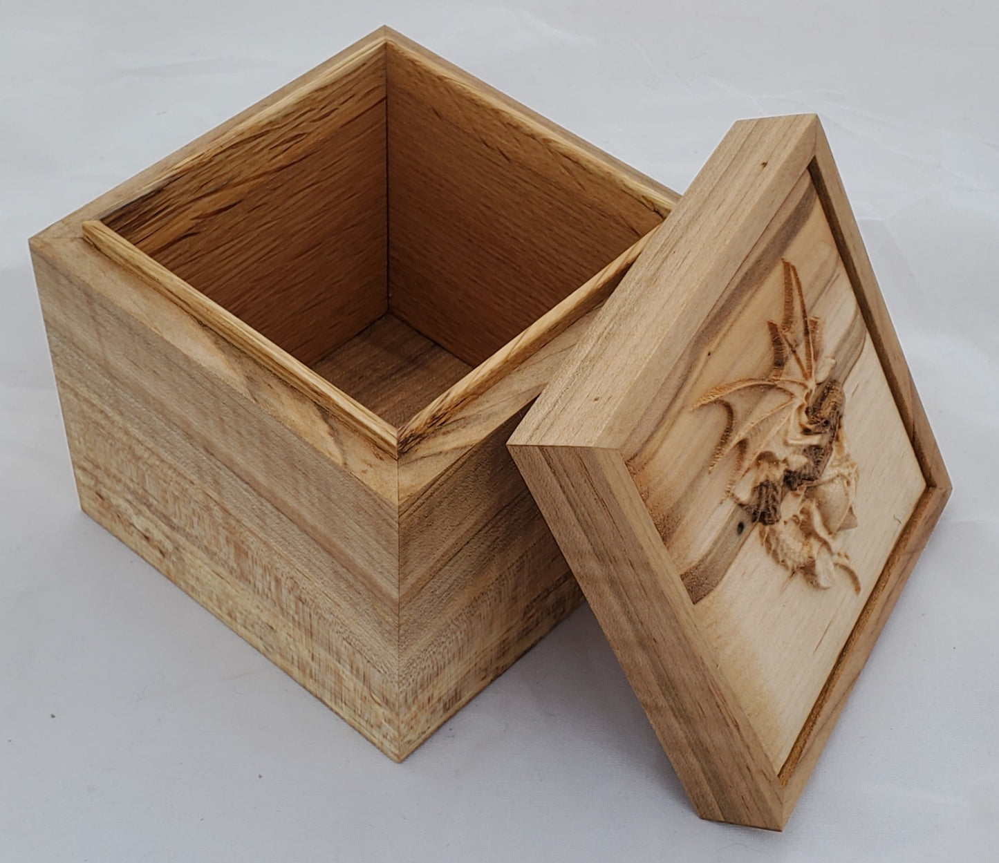 Maple keepsake box or pet urn with a carved Dragon and Rose on top cover