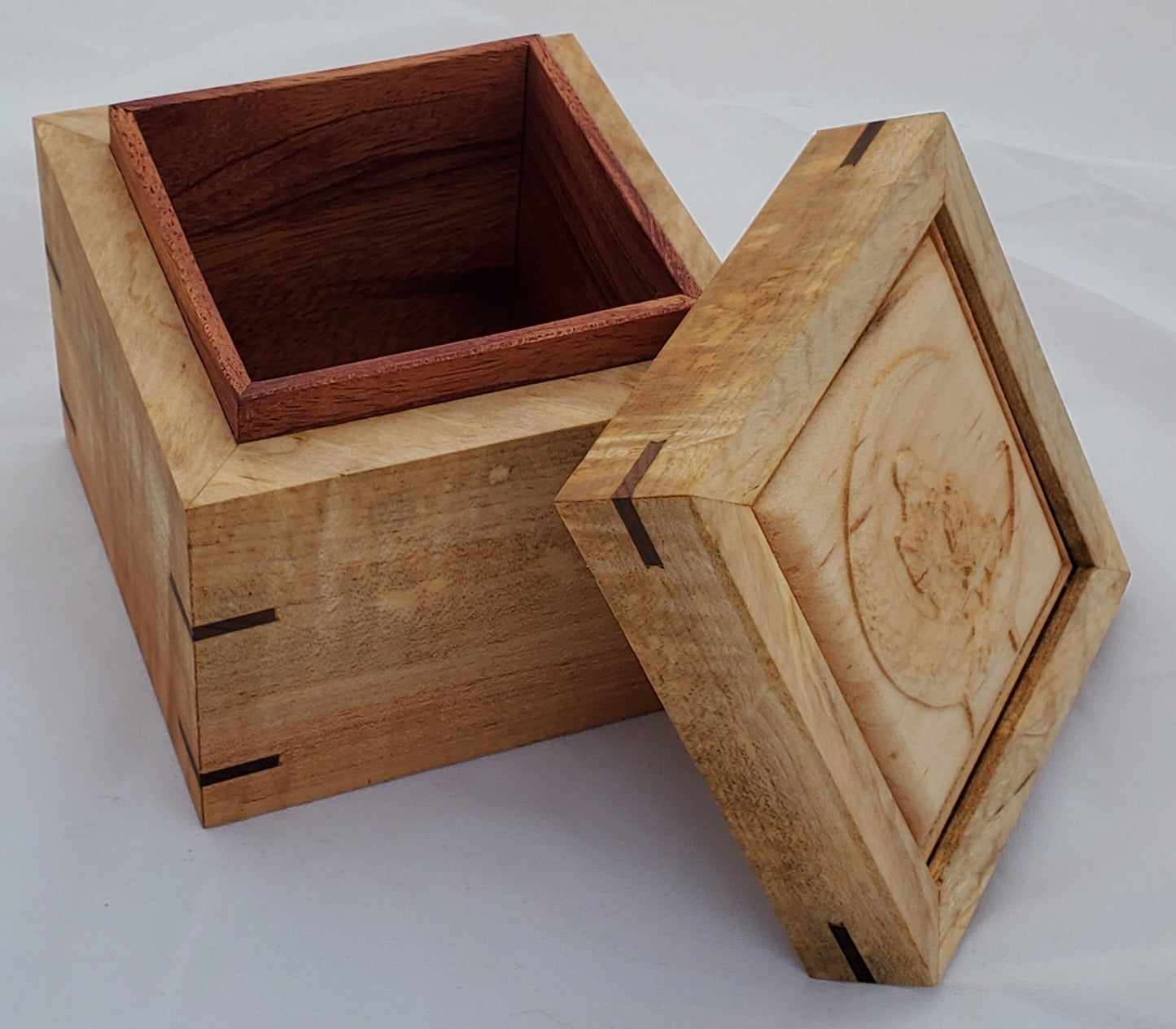 Maple keepsake box or pet urn with a carved Skeletons holding each other while sitting on the moon