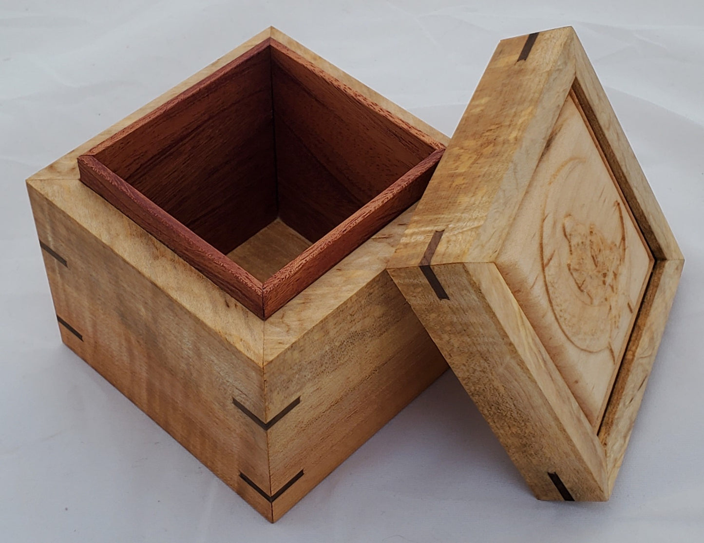 Maple keepsake box or pet urn with a carved Skeletons holding each other while sitting on the moon