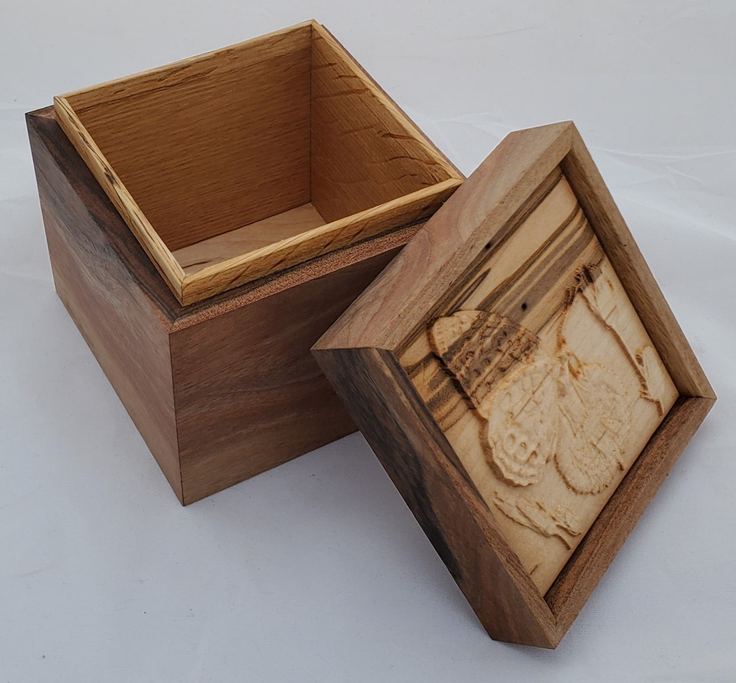 Walnut keepsake box or pet urn with a carved Butterfly top cover